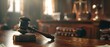 © LELISAT - focus on hammer, group of files on judge table covered with dust - concept of pending old cases or work at judicial court