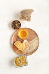 Wall Mural - Composition with different bee products on light background