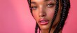 © Boomanoid - Beauty woman with braided hair on red background