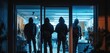 © Boomanoid - A gang of robbers standing in front of a store door at night