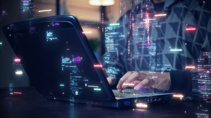 Leinwandbilder - A software development designer or programmer is typing on a computer to create an application using an abstract code language in simulation. Digital cyber security technology concept.