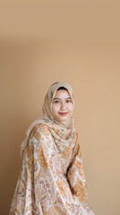 beautiful Indonesian Asian woman in hijab smiling facing the camera ai generated