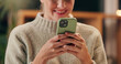 © WesSide/peopleimages.com - Phone, search and hands of woman in house with social media, information or online gossip, chat or communication. Smartphone, smile and girl person with app for games, network or sign up subscription