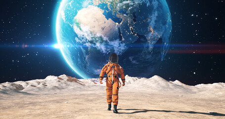 Wall Mural - young male astronaut in space suit confidently walking on an alien planet. red planet earth is visib
