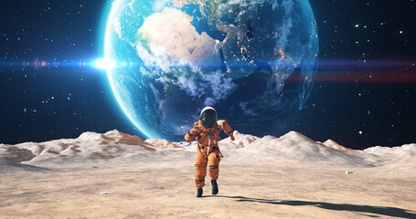 Wall Mural - young astronaut in space suit confidently running on an alien planet. planet earth is visible in sky