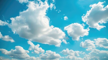 Wall Mural - Blue sky and fluffy white clouds background outdoors