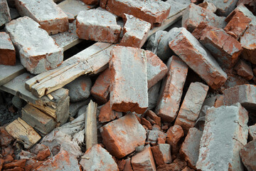 Sticker - Pile of old bricks at a construction site. Building dismantling concept