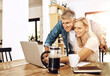 © MollerFinest/peopleimages.com - Happy couple, laptop and budget in living room for vacation, retirement and planning at home. Senior man, woman and together on computer for finance, money and savings account for holiday with joy