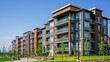 © Zidane - Modern brown apartment buildings in a housing development area