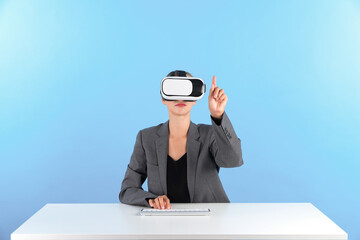 Wall Mural - Smart manager wearing VR glasses while sitting at table with keyboard. Businesswoman pointing to manage data analysis while using suit and visual reality headset and enter in metaverse. Contraption.