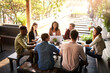 © JorSons/peopleimages.com - Creative, workshop and business people in cafe for discussion, planning and startup project development with team. Collaboration, men and women in coffee shop with laptop, proposal and design ideas