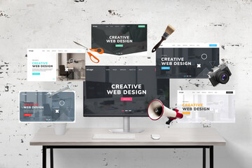Leinwandbilder - Web pages flying around a web designer's desk and computer display featuring an agency web page presentation. Includes web designer tools: megaphone, wrench key, photo camera, scissors, and brush