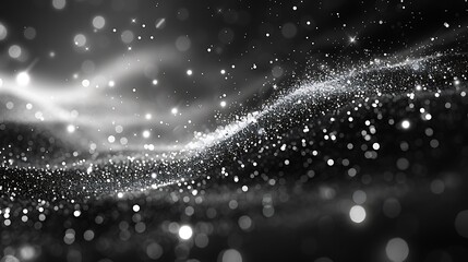 shimmering particles on a solid grey background