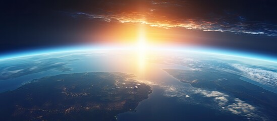 Wall Mural - Global view of Planet Earth with the sun in the background perfect for copy space image