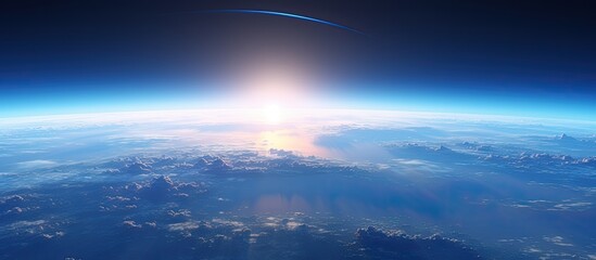 Wall Mural - a serene blue sunrise captured in a breathtaking aerial view showcasing planet earth with a vast exp