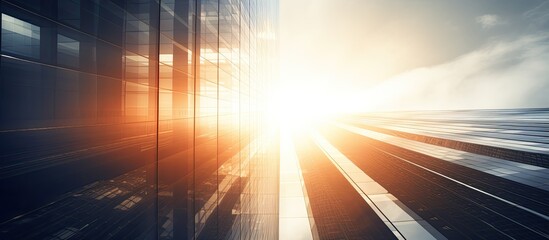 Poster - Abstract view of a skyscraper with sunlight creating copy space image