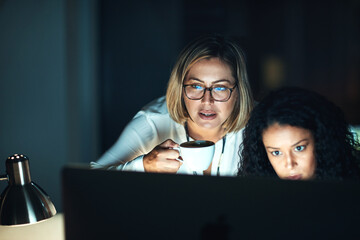 Fototapete - Night, working and business women with computer and tech for web design with collaboration and teamwork. Internet, research and creative deadline of project management of website update in office