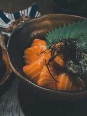 Wall Mural - Slice sashimi with rice in Japanese restaurant. Close up