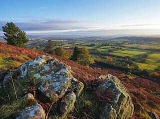 Wall Mural - The rugged beauty of yorkshire dales rocks, with its rolling hills and distant horizon view from shoulders over boulders overlooking an expansive field below.