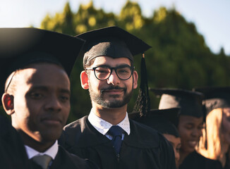 Poster - Celebration, graduation and portrait of student man outdoor on campus with friends for ceremony or event. Education, face and smile with happy graduate person at college or university for success