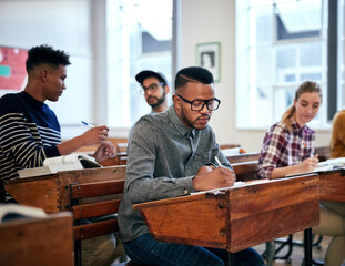 Aufkleber - Classroom, university and group of students with exam for education, scholarship or studying. College, knowledge and young people write notes for learning in lecture for test or assignment at campus.