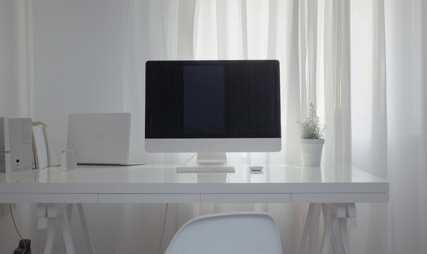A white minimalistic computer desk