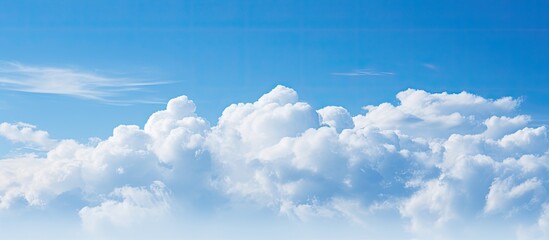Wall Mural - white clouds and blue sky. creative banner. copyspace image