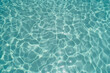 © Nadia Do - Up view photo of still transparent turquoise surface of the water of the swimming pool