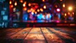 © Aleena - Wooden table with blurred background of night club interior at dark, bokeh lights and colorful light effects with space for text copy