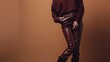 © The Little Hut - Fashionable confident woman wearing burgundy color knitted sweater faux leather pants pointed toe boots posing on brown background Fulllength studio fashion portrait : Generative AI