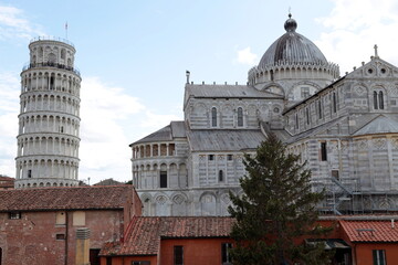 Wall Mural - The Cathedral and the Leaning Tower seen from the ancient city walls of Pisa, Italy.