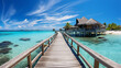 © Muttaki - Stunning Maldives panorama: luxury resort villas over a vibrant blue sea, under a clear sky. A fantastic jetty completes this tranquil tropical beach landscape, perfect for a summer vacation.