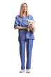 © Ljupco Smokovski - Female veterinarian in a blue uniform holdign a westie terrier dog