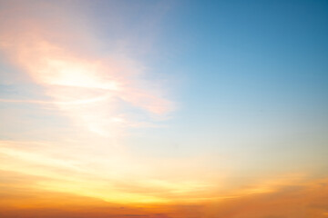 Wall Mural - beautiful , luxury soft gradient orange gold clouds and sunlight on the blue sky perfect for the bac
