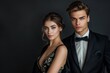 © Руслан Галиуллин - gorgeous couple in evening dresses on black background, luxury