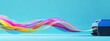 © Art_You - Blue printer producing vibrant, flowing ribbons in a creative display against a turquoise background