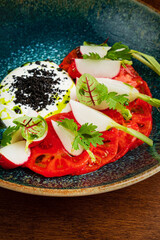 Wall Mural - caprese salad with radish and sauce