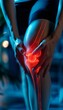 © Sorat - Close-up of person holding painful knee joint highlighted in red, indicating inflammation or injury in a sports or medical context.