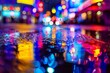 © volga - Vibrant city lights reflection on wet surface at night