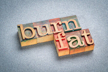Wall Mural - burn fat - text in retro letterpress wood type, metabolism, health and lifestyle concept