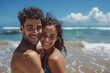 © Fotograf - A man and a woman sharing a romantic moment on the beach, perfect for use in travel or relationship-themed projects