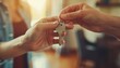 © Maksym - Real estate agent handing over keys to woman in a significant property acquisition moment
