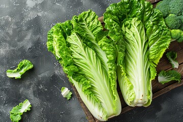 Wall Mural - Chinese cabbage on a dark background, top view