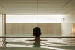 © ADDICTIVE STOCK - Serene moment at a modern spa pool. Generative AI image