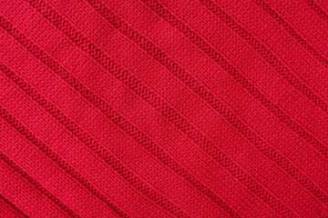 Canvas Print - Closeup view of red knitted texture as background