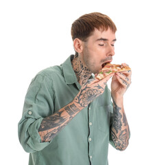 Sticker - Handsome tattooed young man eating slice of tasty pizza on white background