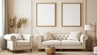 © Natalia - Elegant living room interior with tufted white sofas, decorative frames, and plants