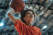 © Jorge Ferreiro - determined young athlete practicing basketball indoor