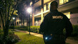 © Michael - Security guard is protecting an apartment complex at night