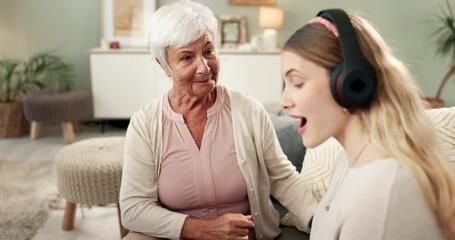 Sticker - Headphones, grandmother and daughter with music, listen and online in home. Technology, podcast and shocked for asmr sound on internet, digital and family for retired person in lounge for streaming